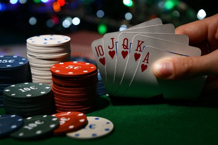 Live dealer at baccarat table communicating with players via multilingual chat